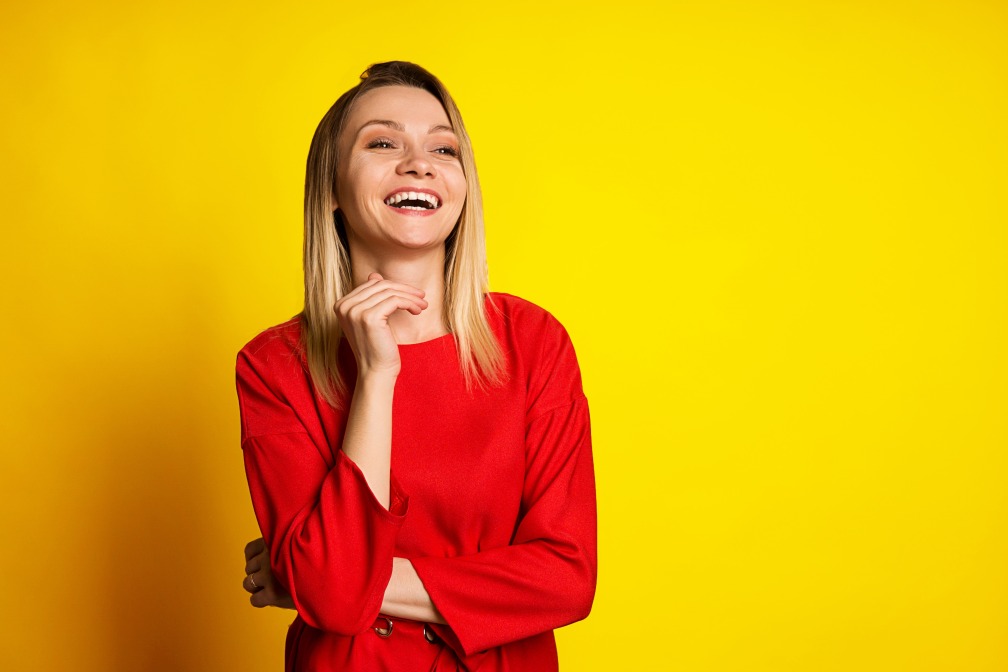 Happy Lauging Woman Yellow Background EQ Emotional Intelligence